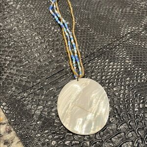 Elegant Shell Pendant Necklace with Gold and Blue Beads